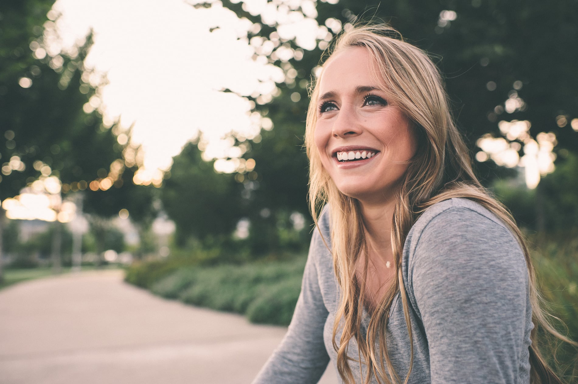Woman smiling after getting her wisdom tooth pulled in Castle Rock CO