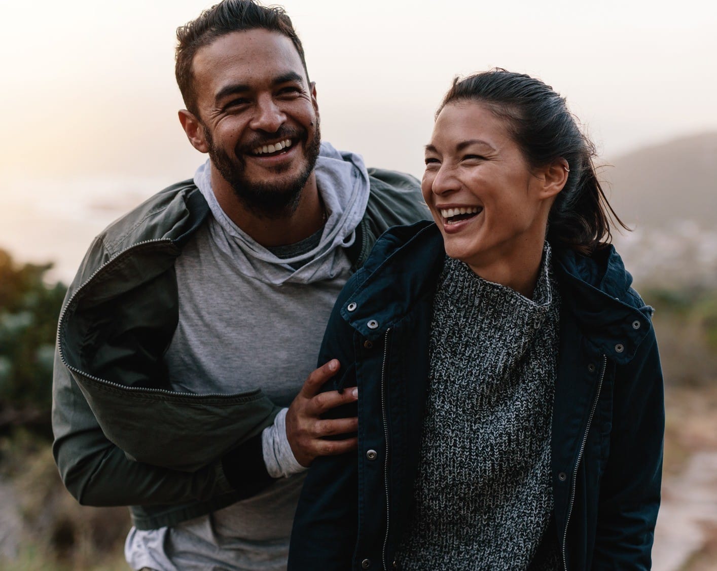 Couple walking happily after root canal therapy in Castle Pines CO